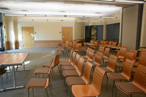 Hopewell Manufacturing Association Room with multiple chairs arranged in auditorium-style seating